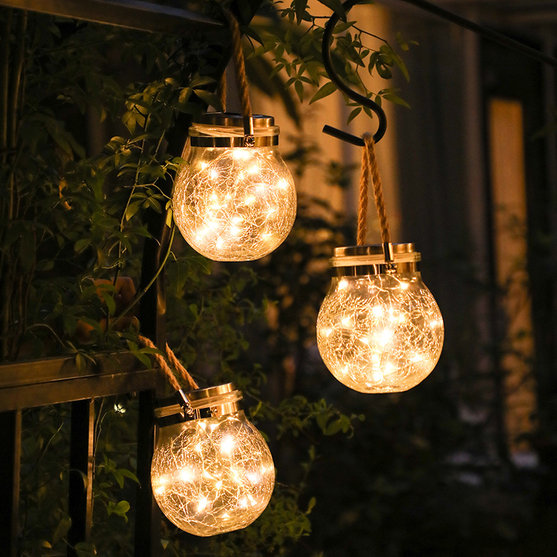 Lanterne Solaire à LED dans un Verre - Éclairage Décoratif de Jardin avec Lumières Filaires et Poignée de Transport